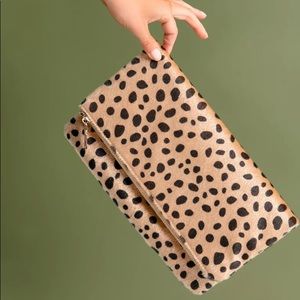 TUCKERNUCK Leopard Foldover Clutch
POMANDER PLACE: USED ONCE